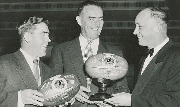 180531_kyne620.png Phonse Kyne, standing between Lou Richards and Syd Coventry, was at the centre of a Collingwood coaching storm in 1950. - Collingwood,Collingwood Magpies